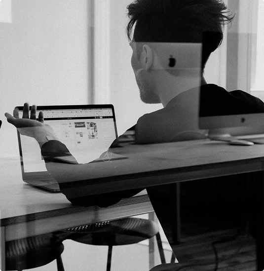 WebOConnect team member working on a software project